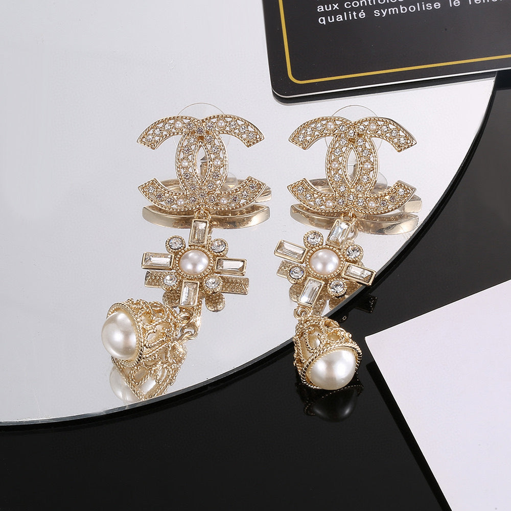 Martin Graham stud earrings in polished metal-tone – front product view