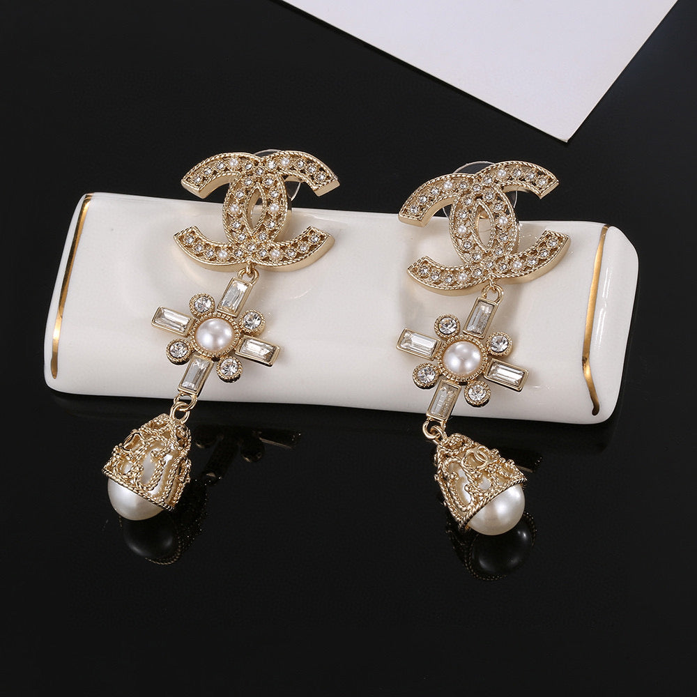 Martin Graham stud earrings in polished metal-tone – side detail