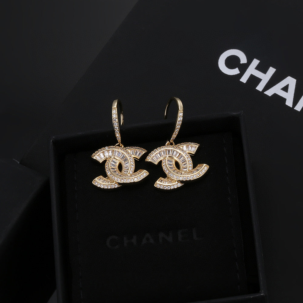 Martin Graham stud earrings in polished metal-tone – front product view