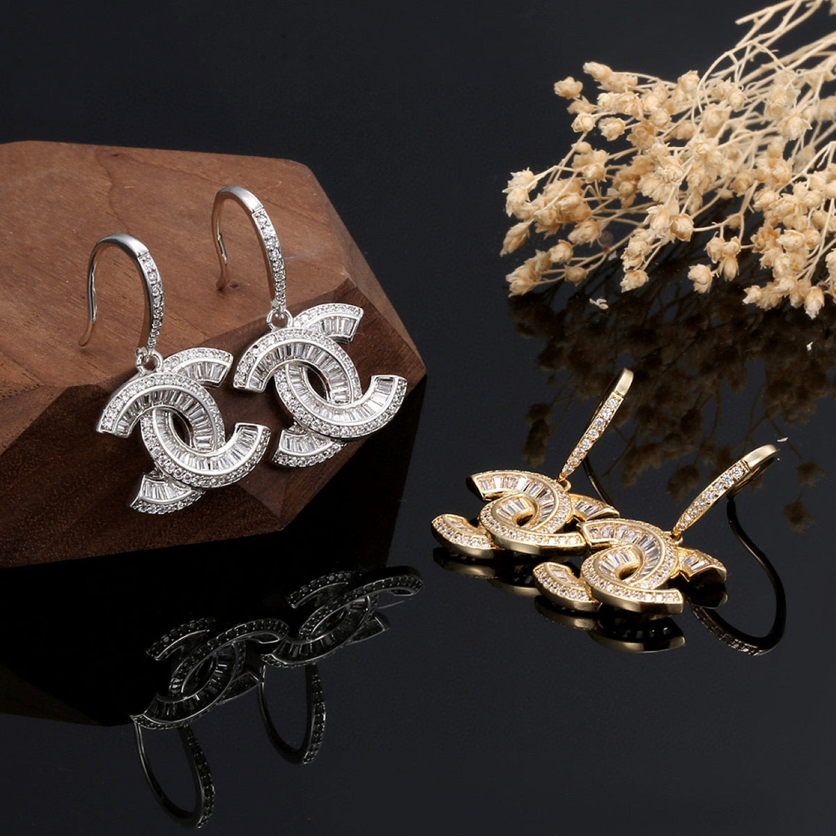 Martin Graham stud earrings in polished metal-tone – styled product view