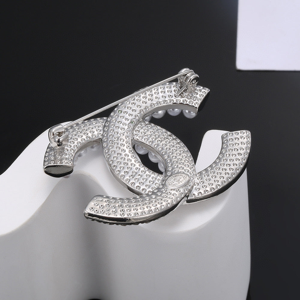 Martin Graham brooch in polished metal-tone – detail view