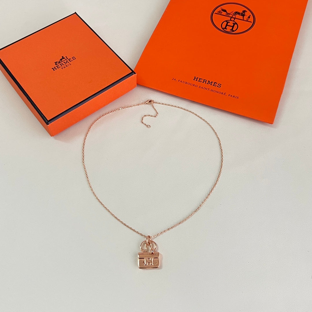 Martin Graham pendant necklace in polished metal-tone – front product view