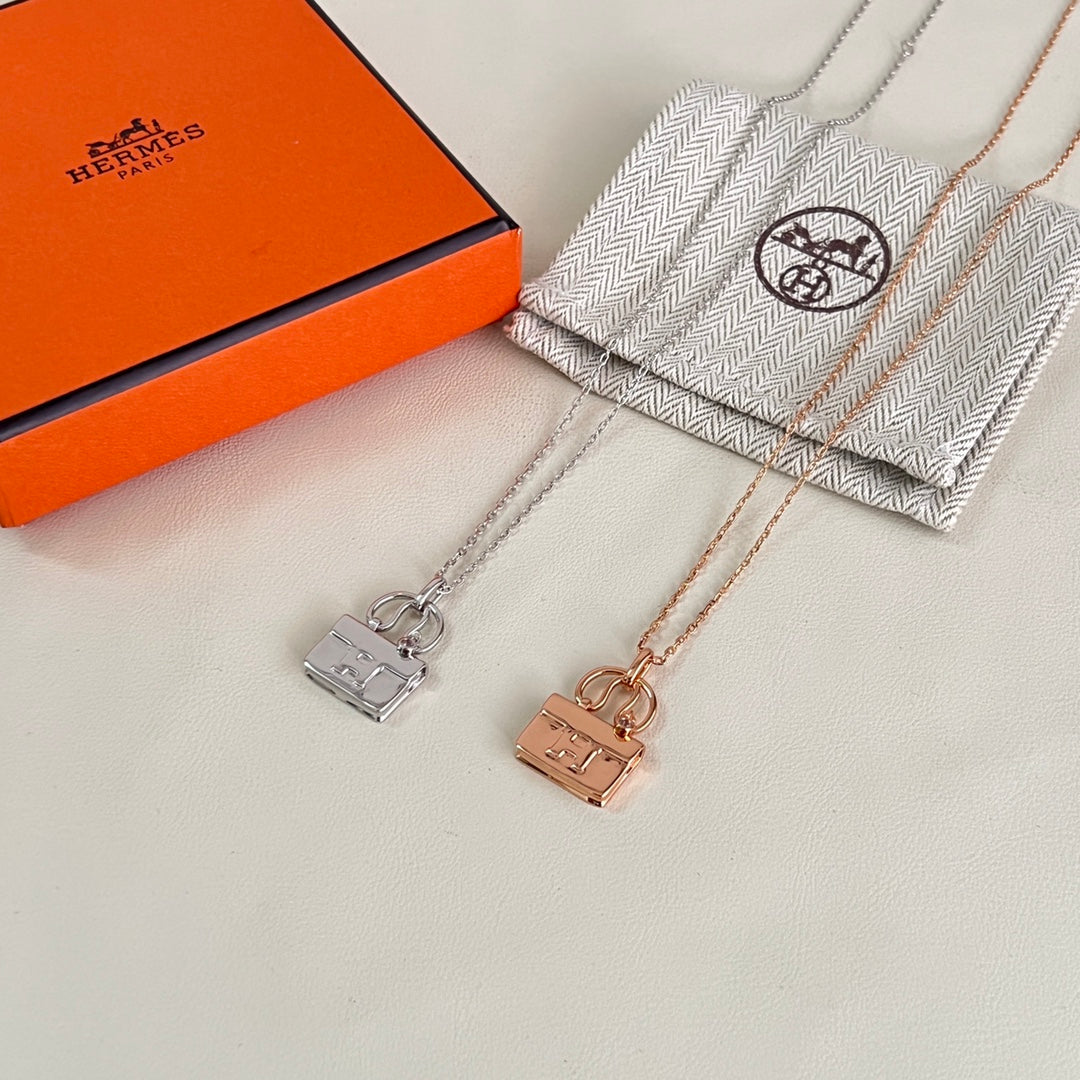 Martin Graham pendant necklace in polished metal-tone – detail view