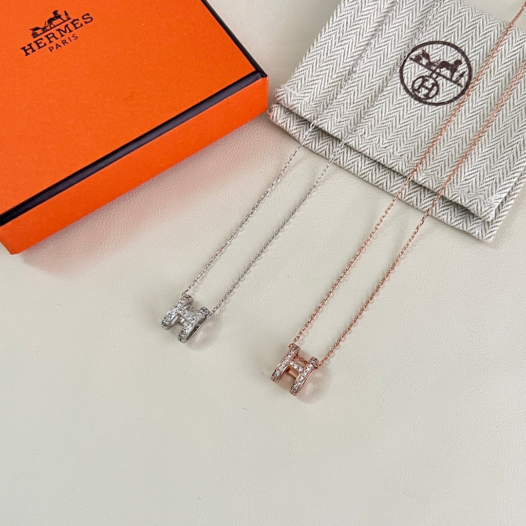 Martin Graham pendant necklace in polished metal-tone – detail view