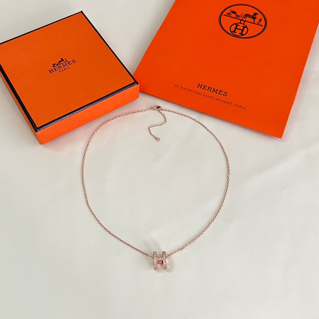 Martin Graham pendant necklace in polished metal-tone – front product view