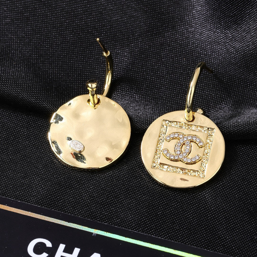Martin Graham earrings in polished metal-tone – main product view