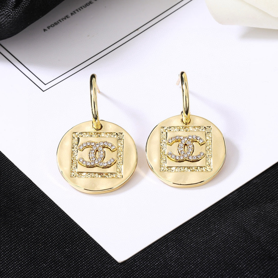 Martin Graham earrings in polished metal-tone – side detail