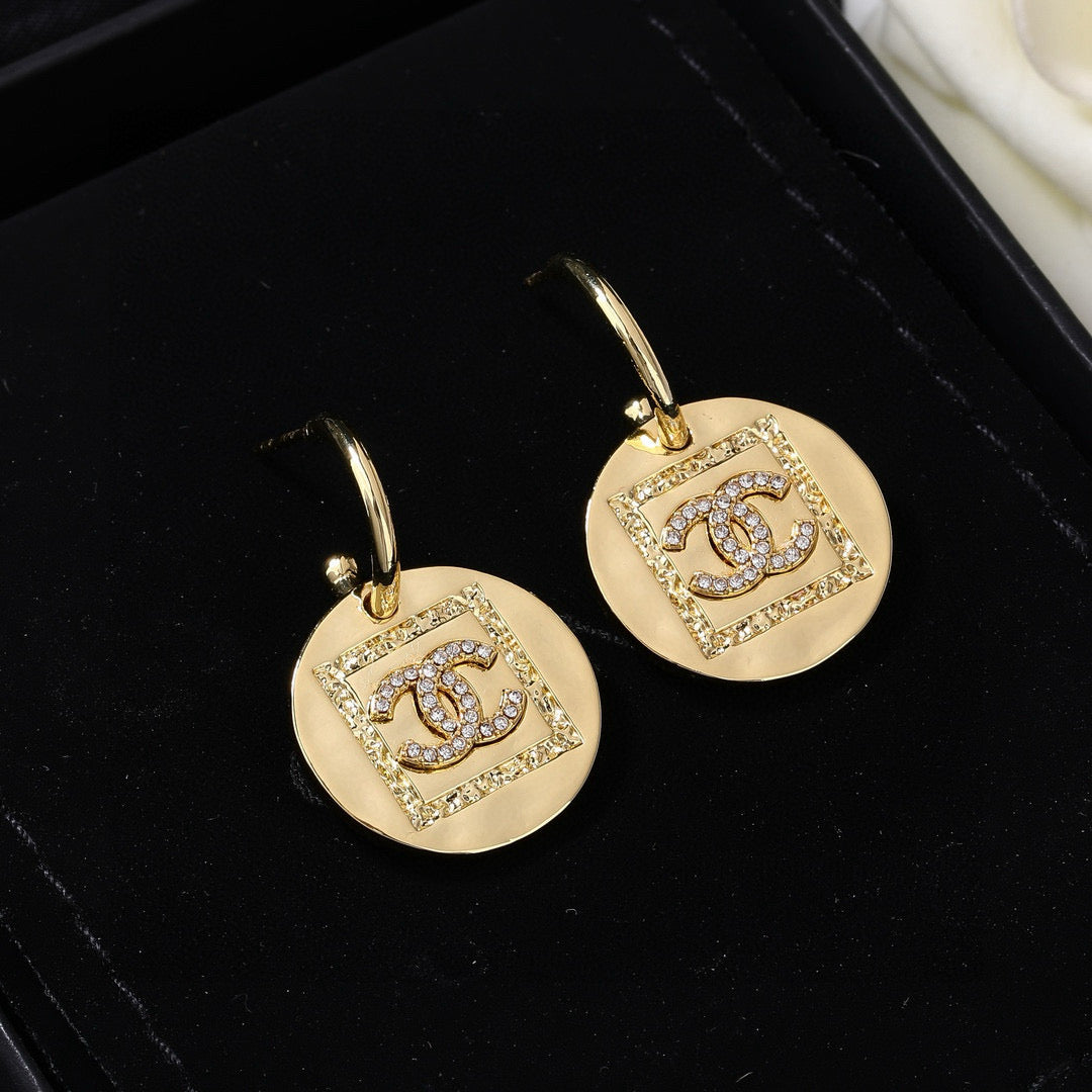 Martin Graham earrings in polished metal-tone – styled product view
