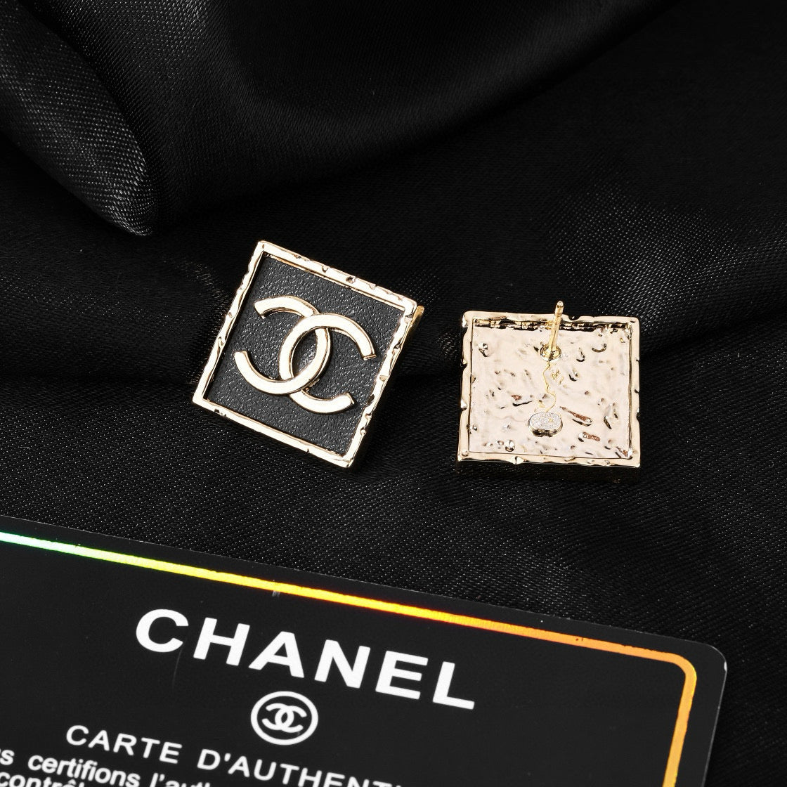 Martin Graham earrings in polished metal-tone – close-up detail