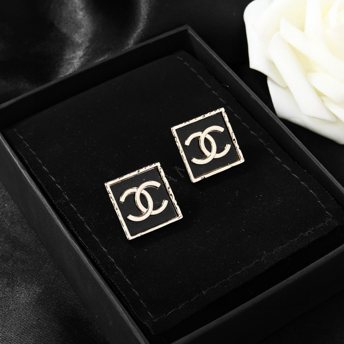 Martin Graham earrings in polished metal-tone – front product view