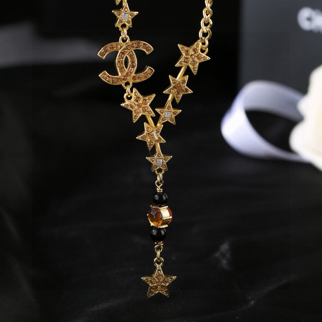 Martin Graham pendant necklace in polished metal-tone – detail view