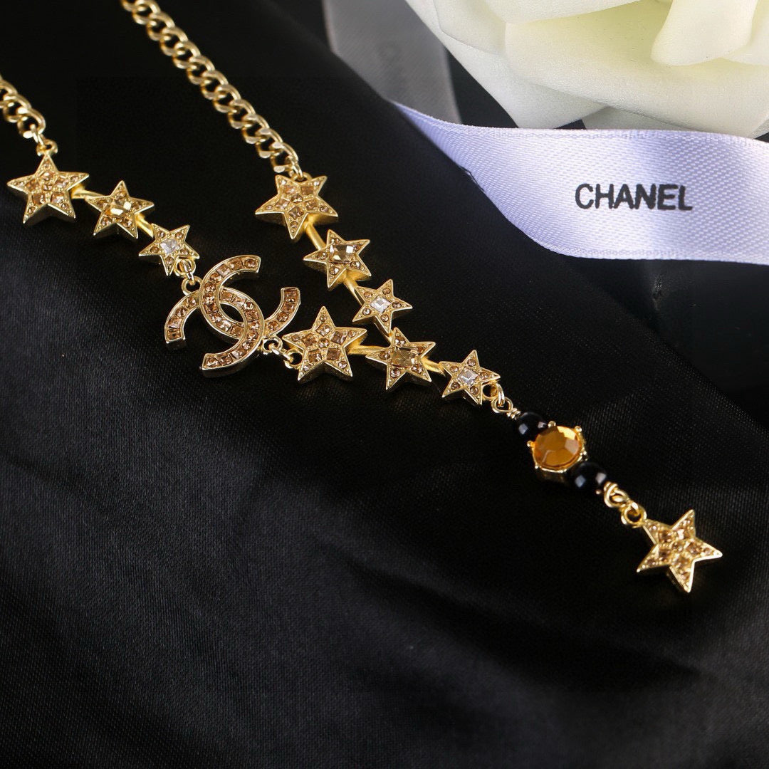 Martin Graham pendant necklace in polished metal-tone – close-up detail