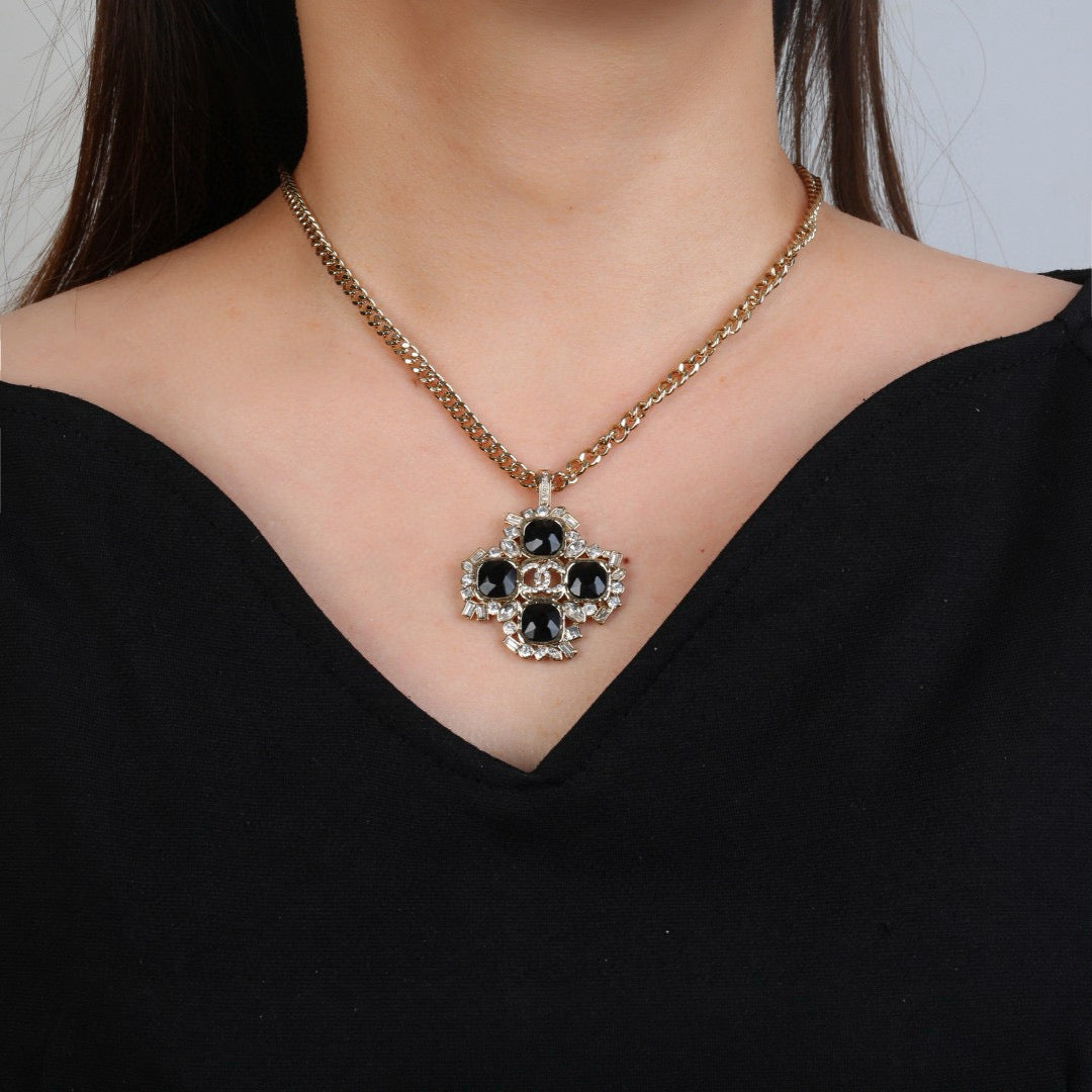 Martin Graham pendant necklace in polished metal-tone – front product view