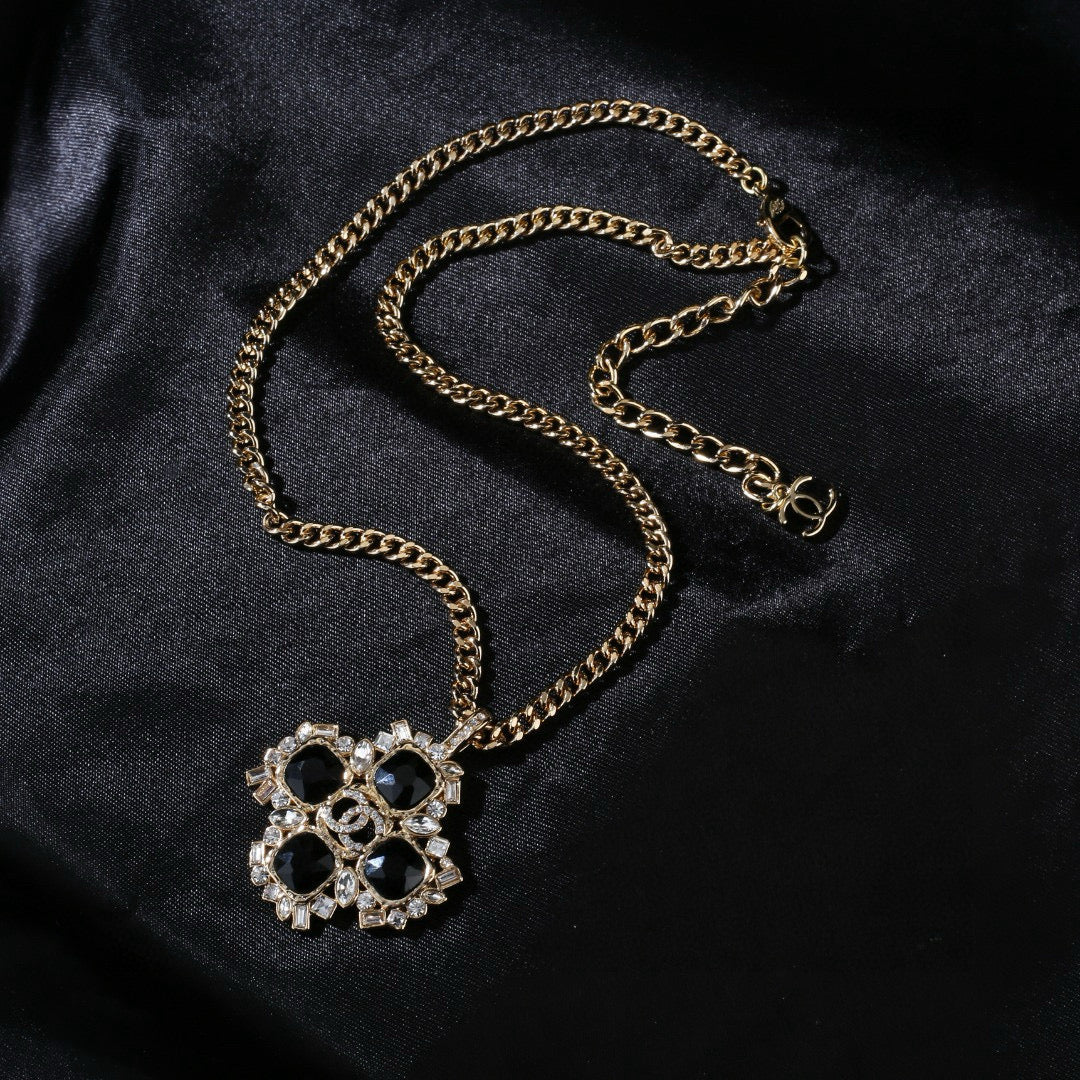 Martin Graham pendant necklace in polished metal-tone – detail view