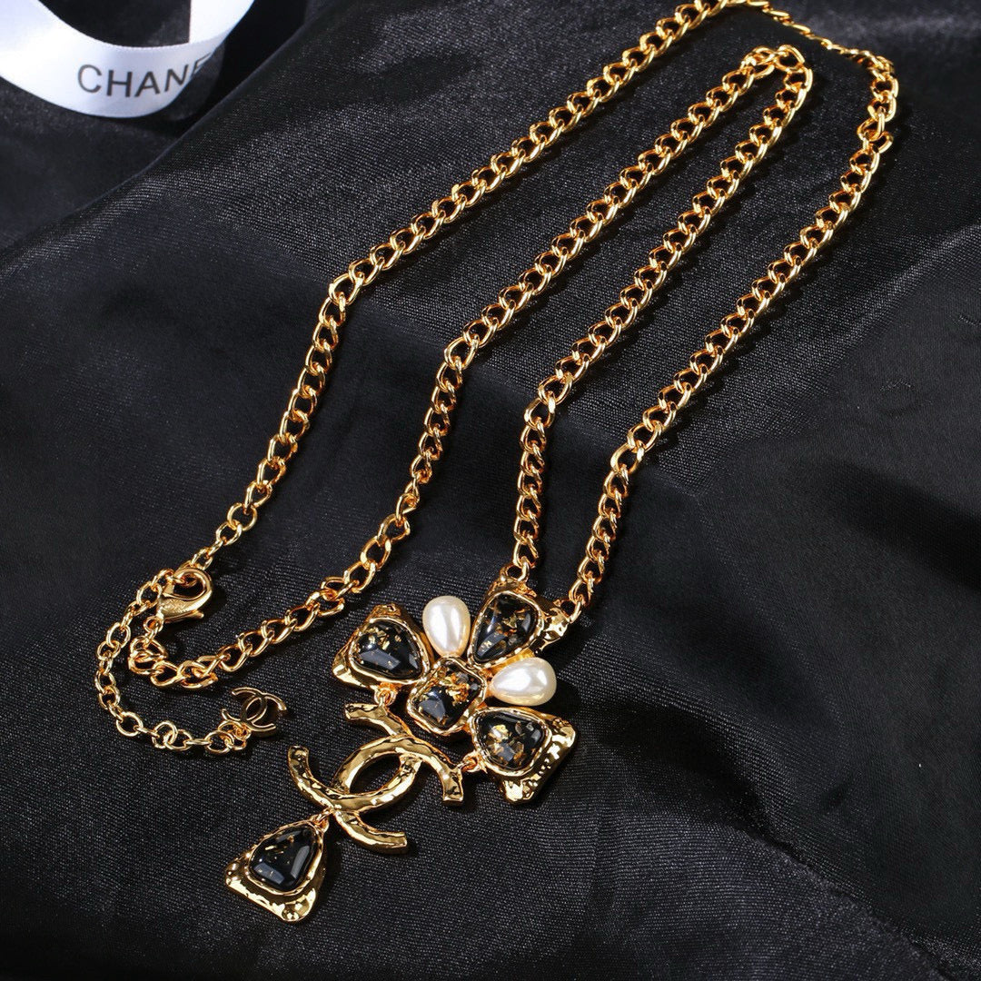 Martin Graham pendant necklace in polished metal-tone – front product view