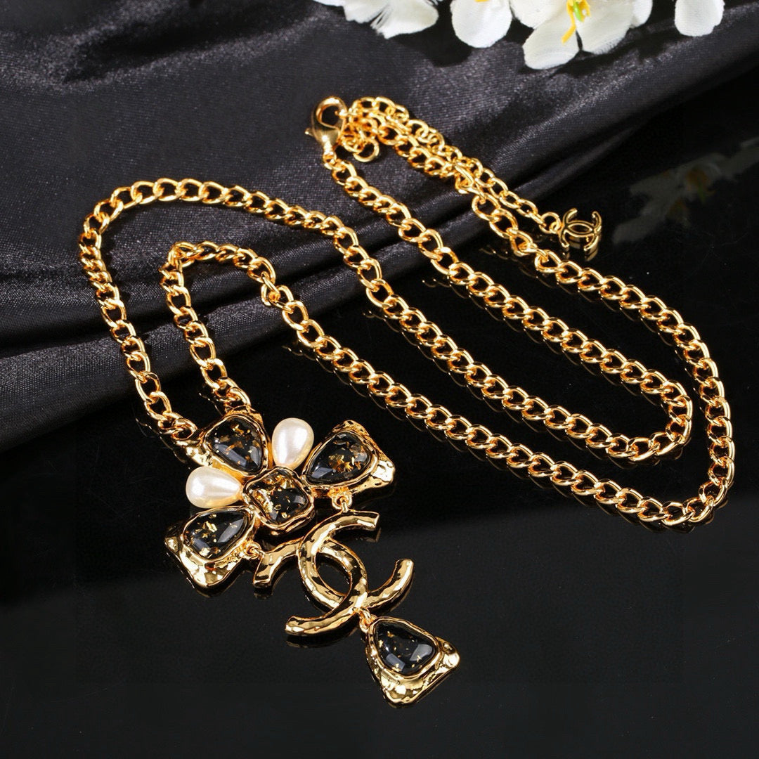 Martin Graham pendant necklace in polished metal-tone – styled product view