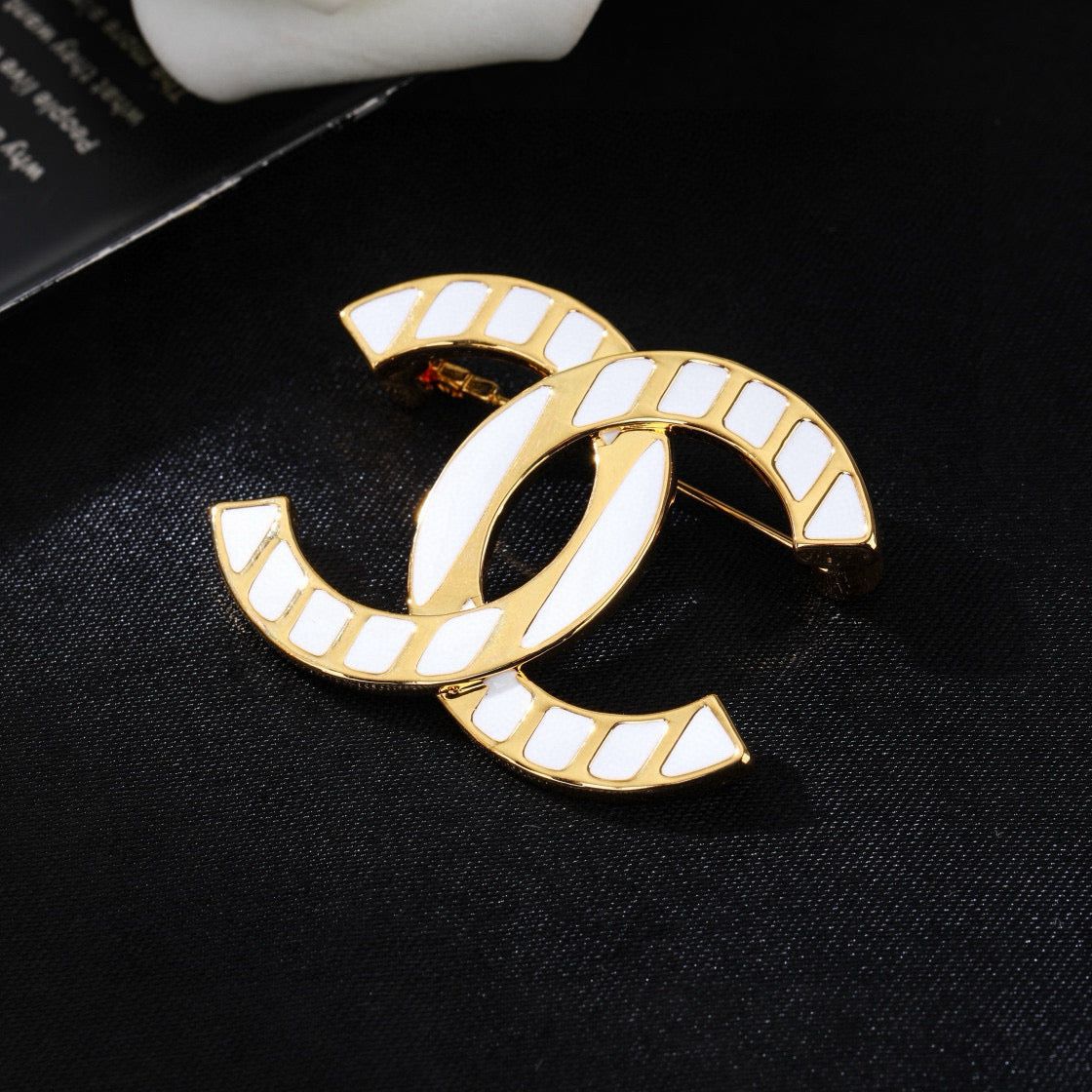 Martin Graham brooch in polished metal-tone – close-up detail