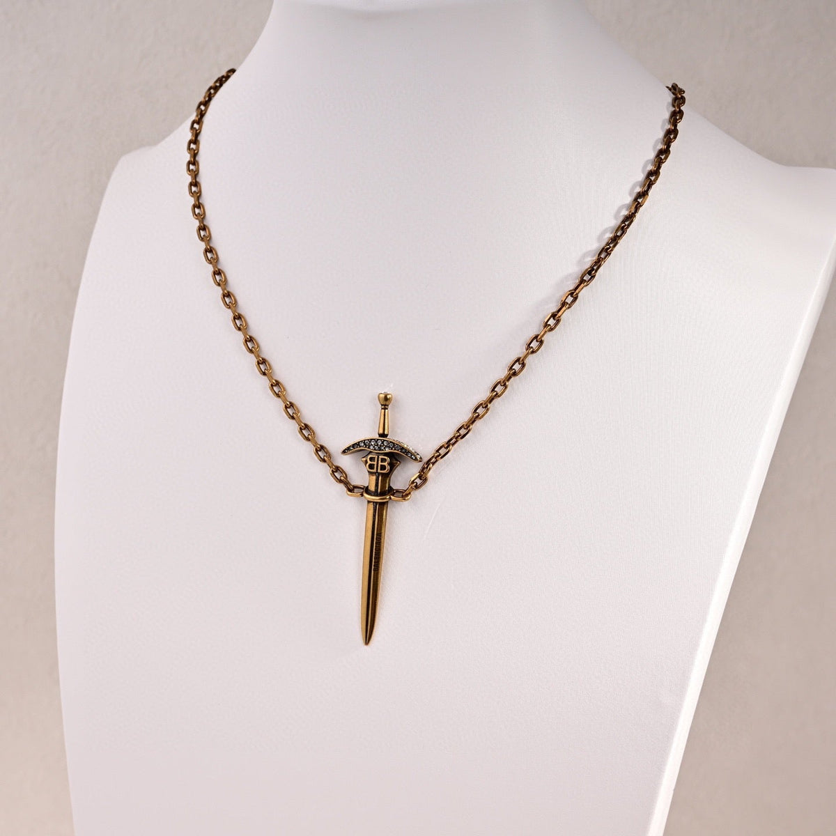 Martin Graham pendant necklace in polished metal-tone – styled product view