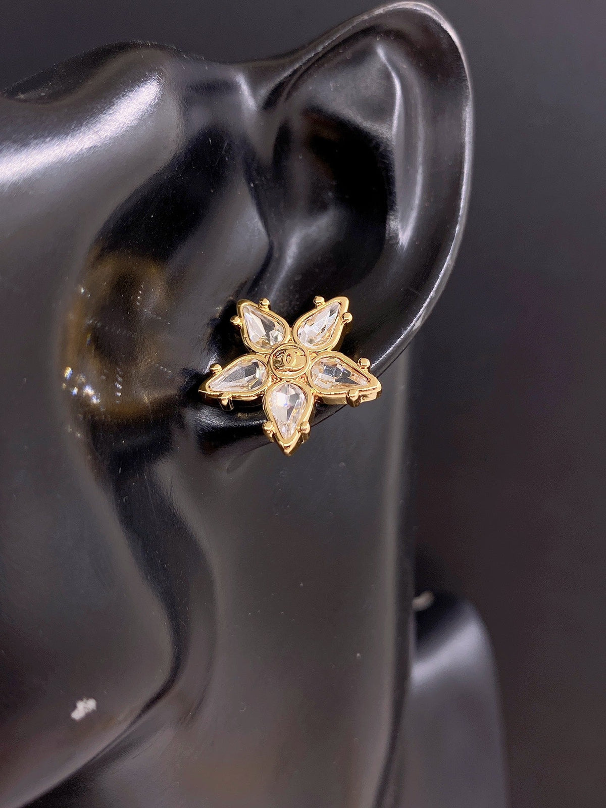 Martin Graham stud earrings in polished metal-tone – front product view