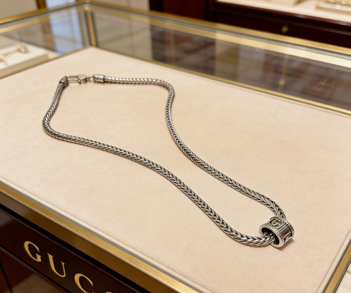 Martin Graham pendant necklace in polished metal-tone – front product view