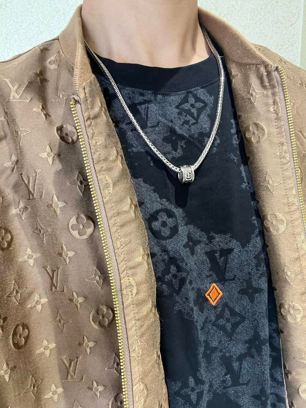 Martin Graham pendant necklace in polished metal-tone – detail view