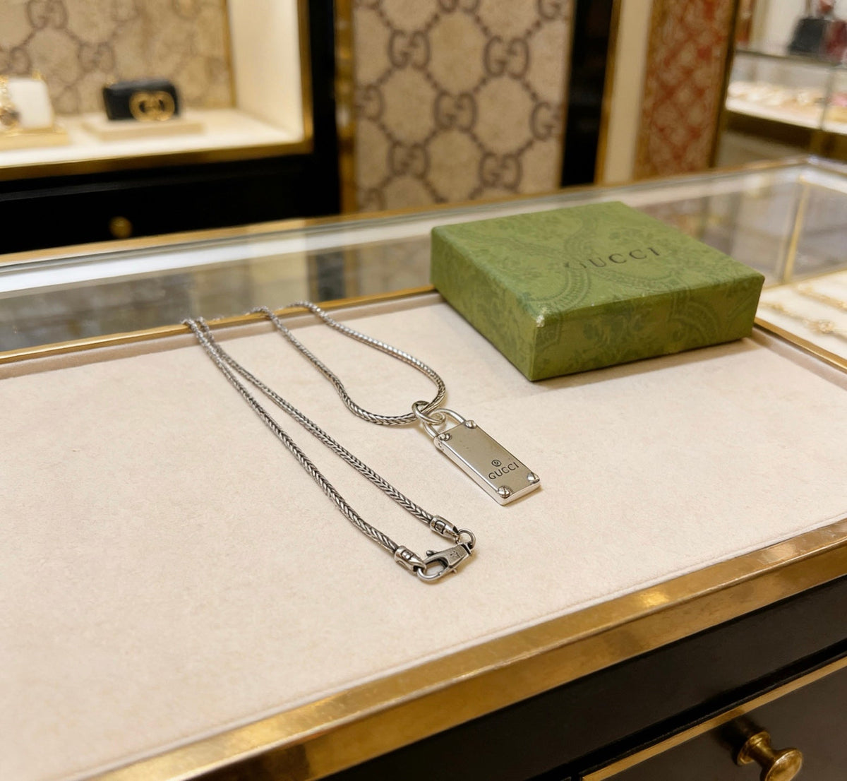 Martin Graham pendant necklace in polished metal-tone – front product view