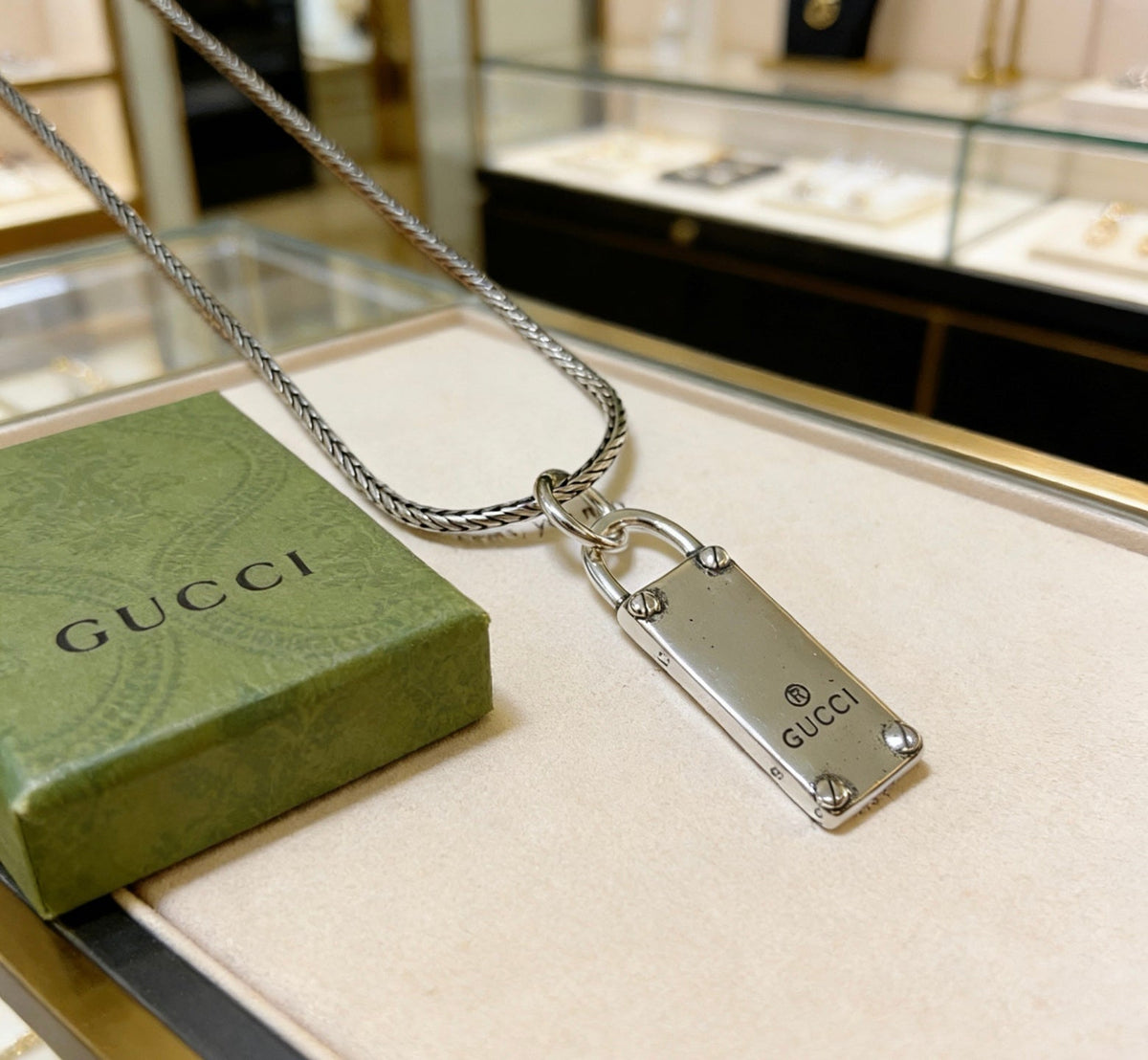 Martin Graham pendant necklace in polished metal-tone – styled product view