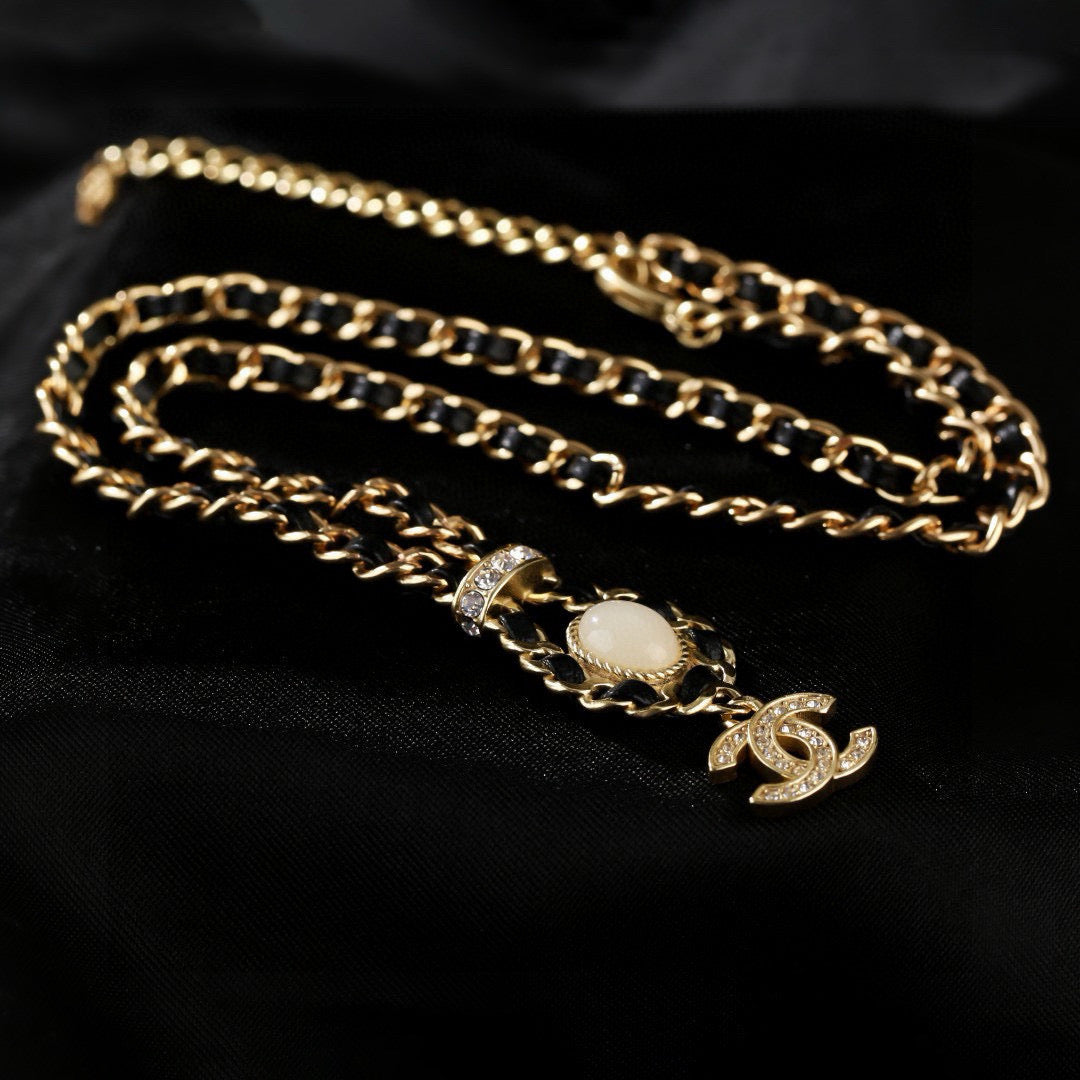 Martin Graham pendant necklace in polished metal-tone – detail view