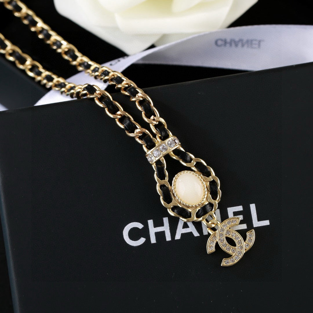 Martin Graham pendant necklace in polished metal-tone – front product view