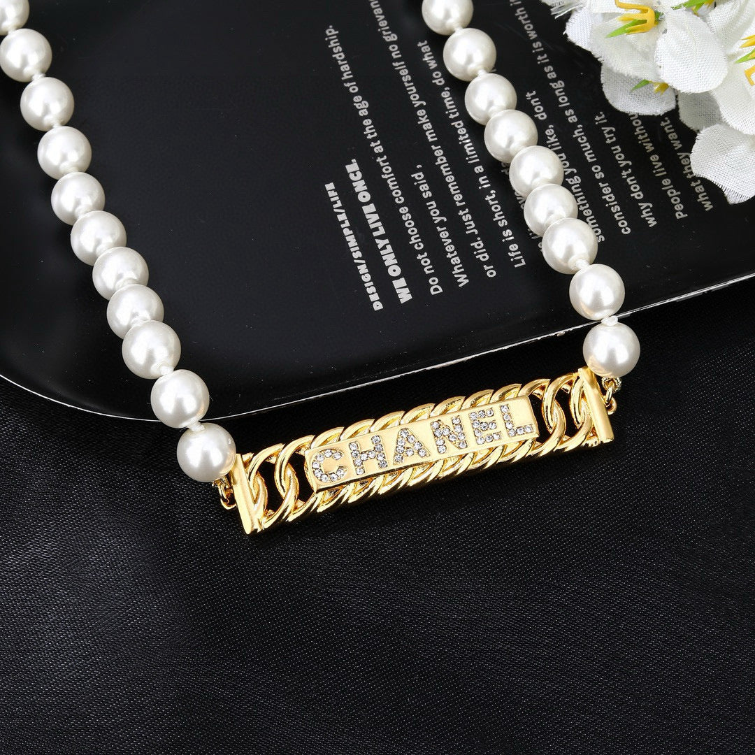 Martin Graham jewelry accessory in polished metal-tone – close-up detail