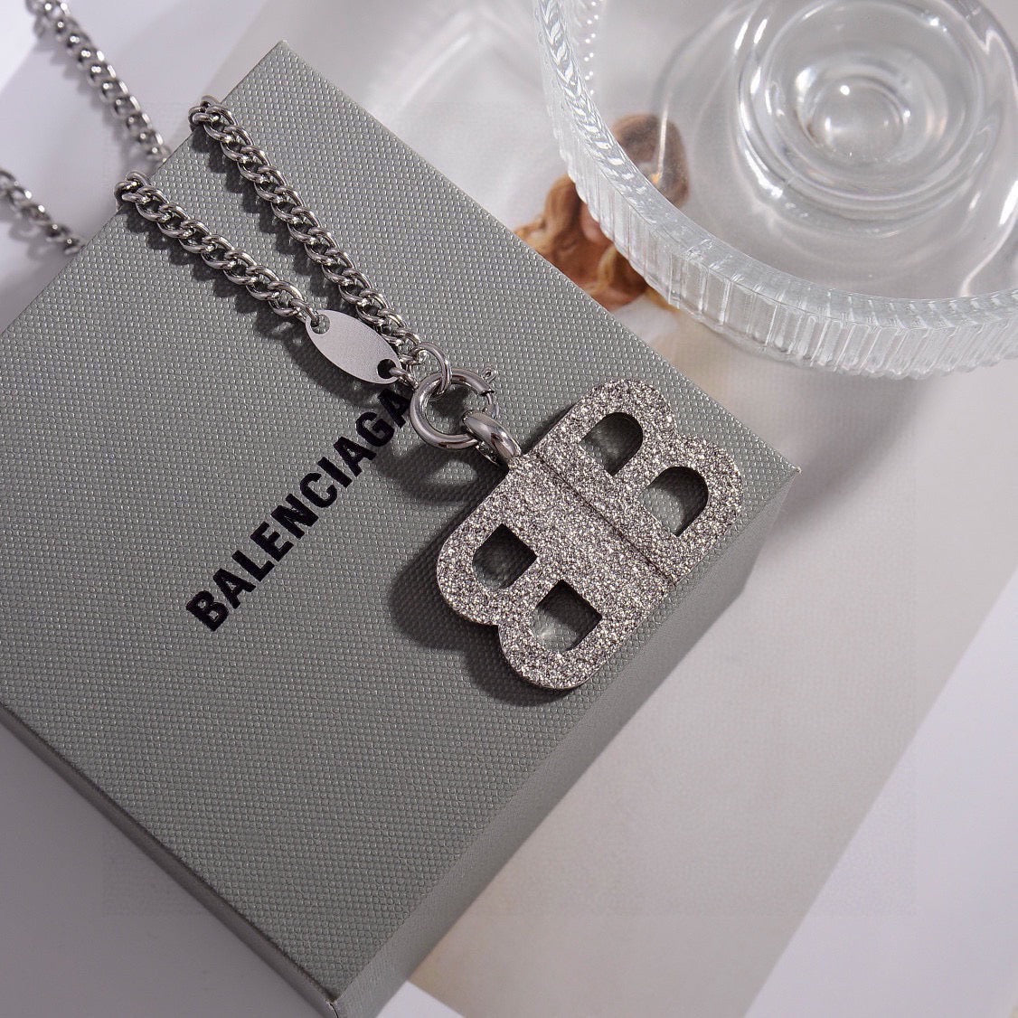 Martin Graham pendant necklace in polished metal-tone – detail view