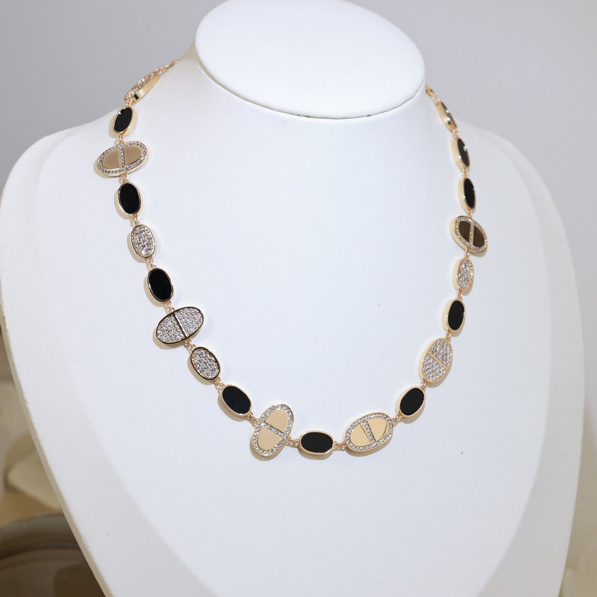 Martin Graham pendant necklace in polished metal-tone – front product view