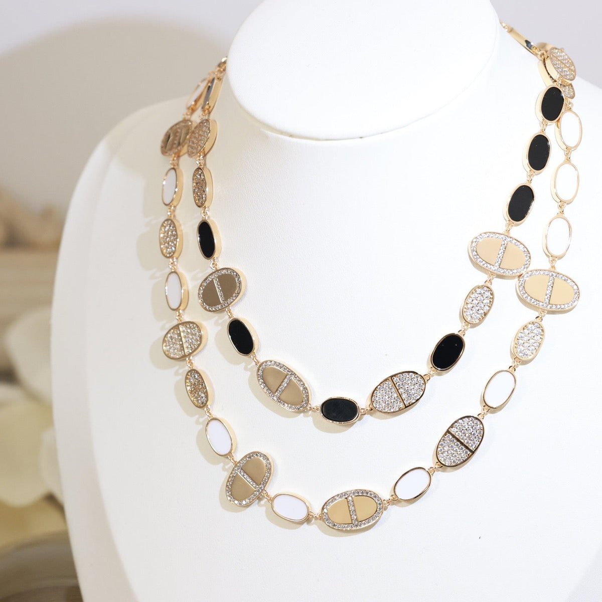 Martin Graham pendant necklace in polished metal-tone – detail view