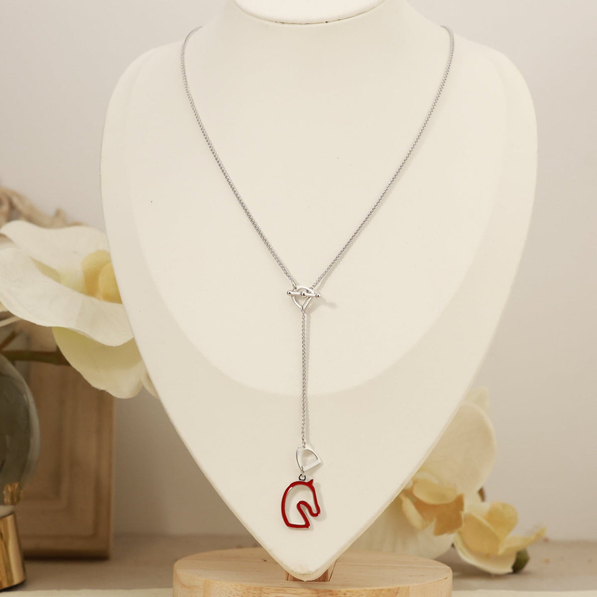 Martin Graham pendant necklace in polished metal-tone – detail view