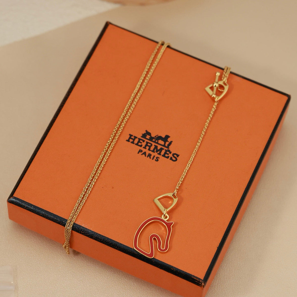 Martin Graham pendant necklace in polished metal-tone – side detail