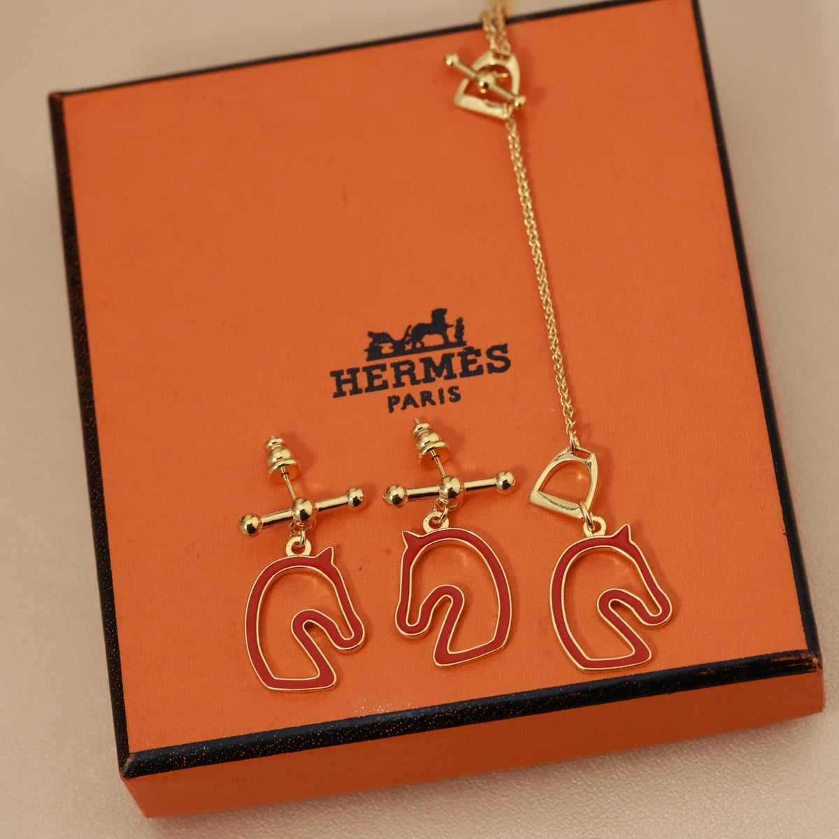 Martin Graham stud earrings in polished metal-tone – main product view