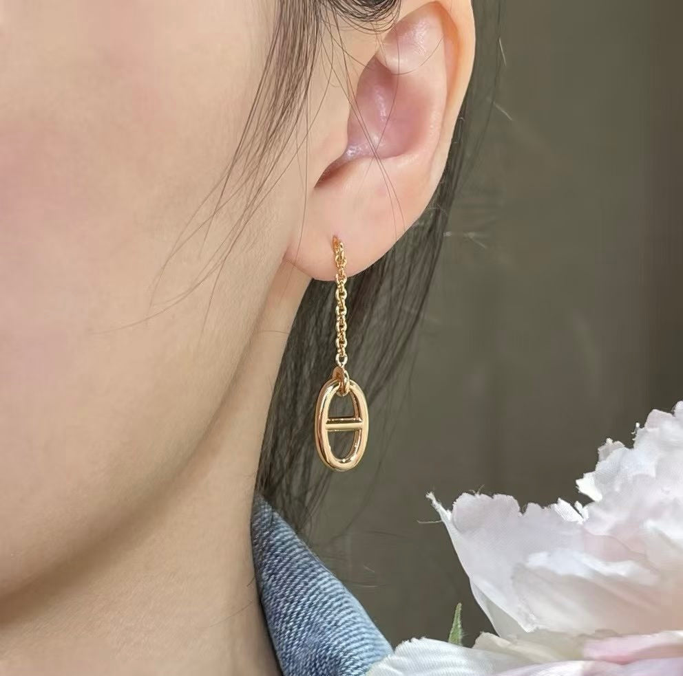 Martin Graham stud earrings in polished metal-tone – main product view