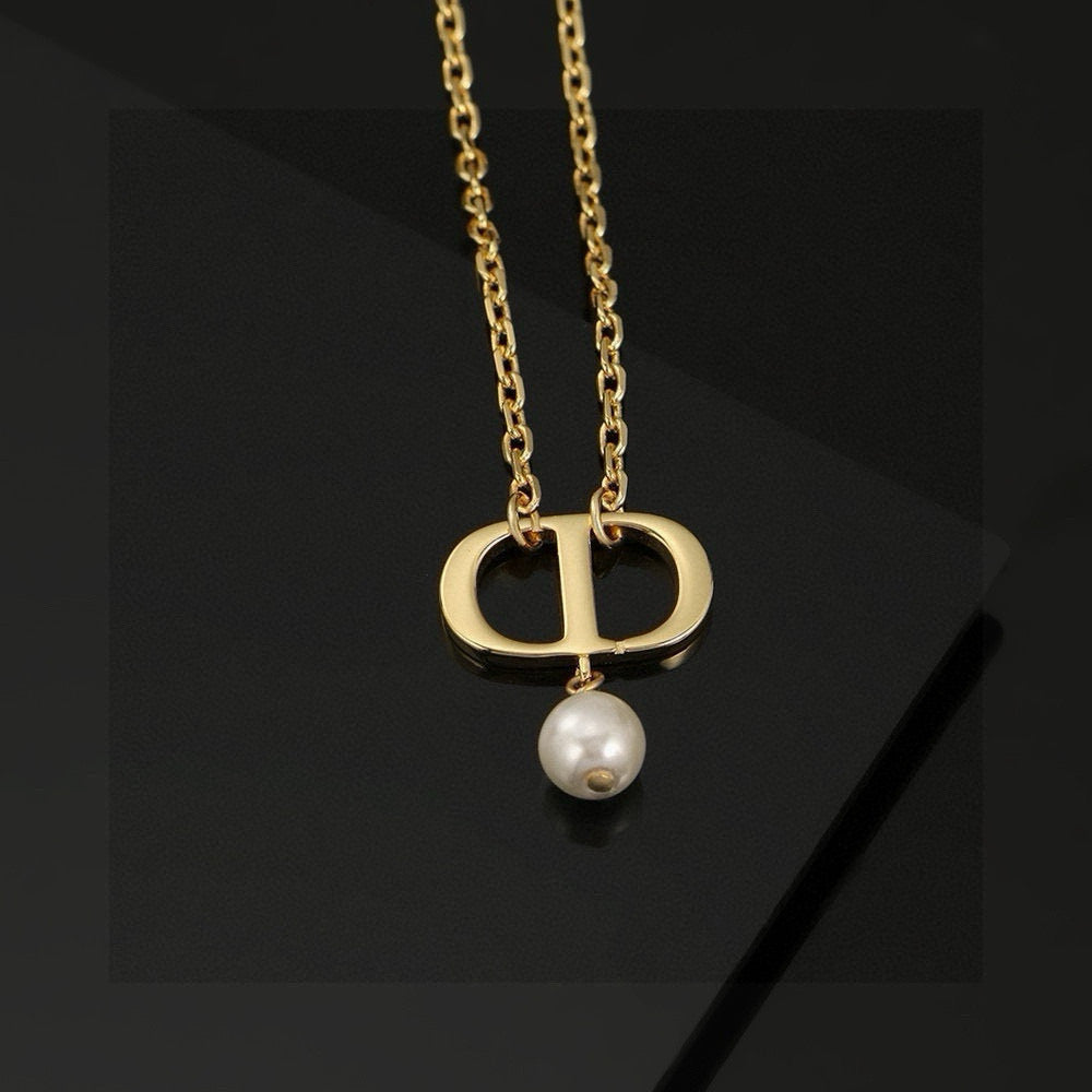 Martin Graham pendant necklace in polished metal-tone