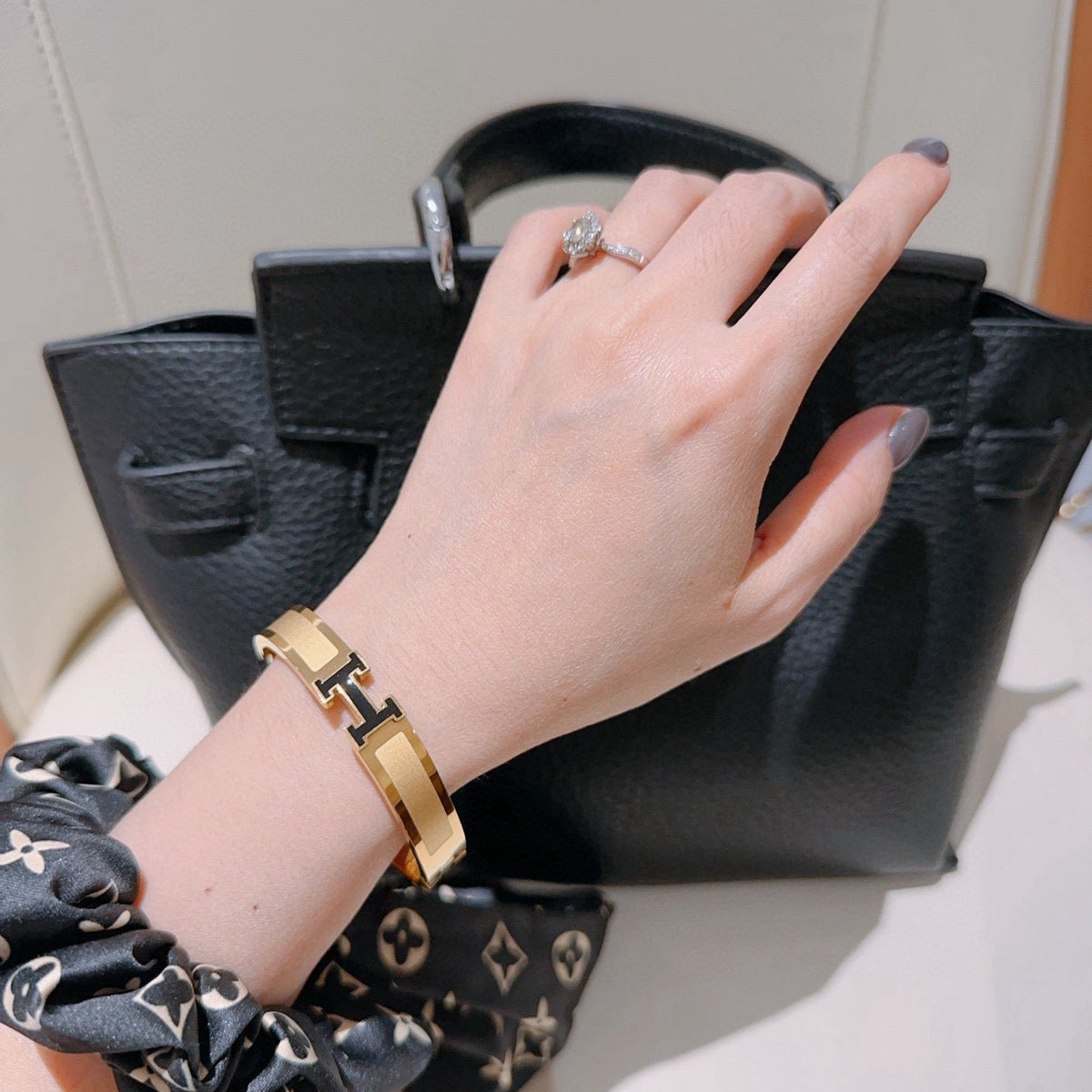Martin Graham bangle in polished metal-tone – detail view