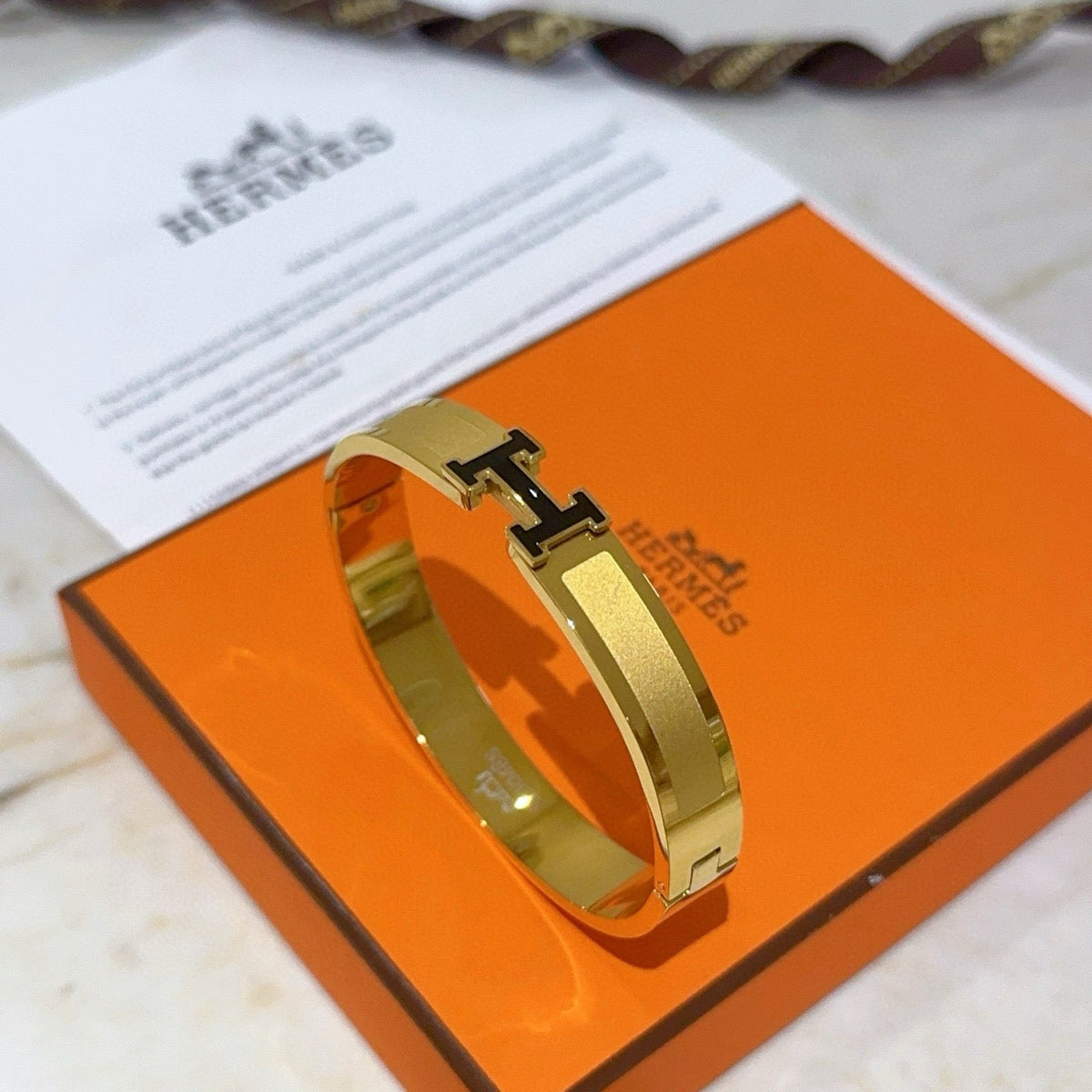 Martin Graham bangle in polished metal-tone – main product view