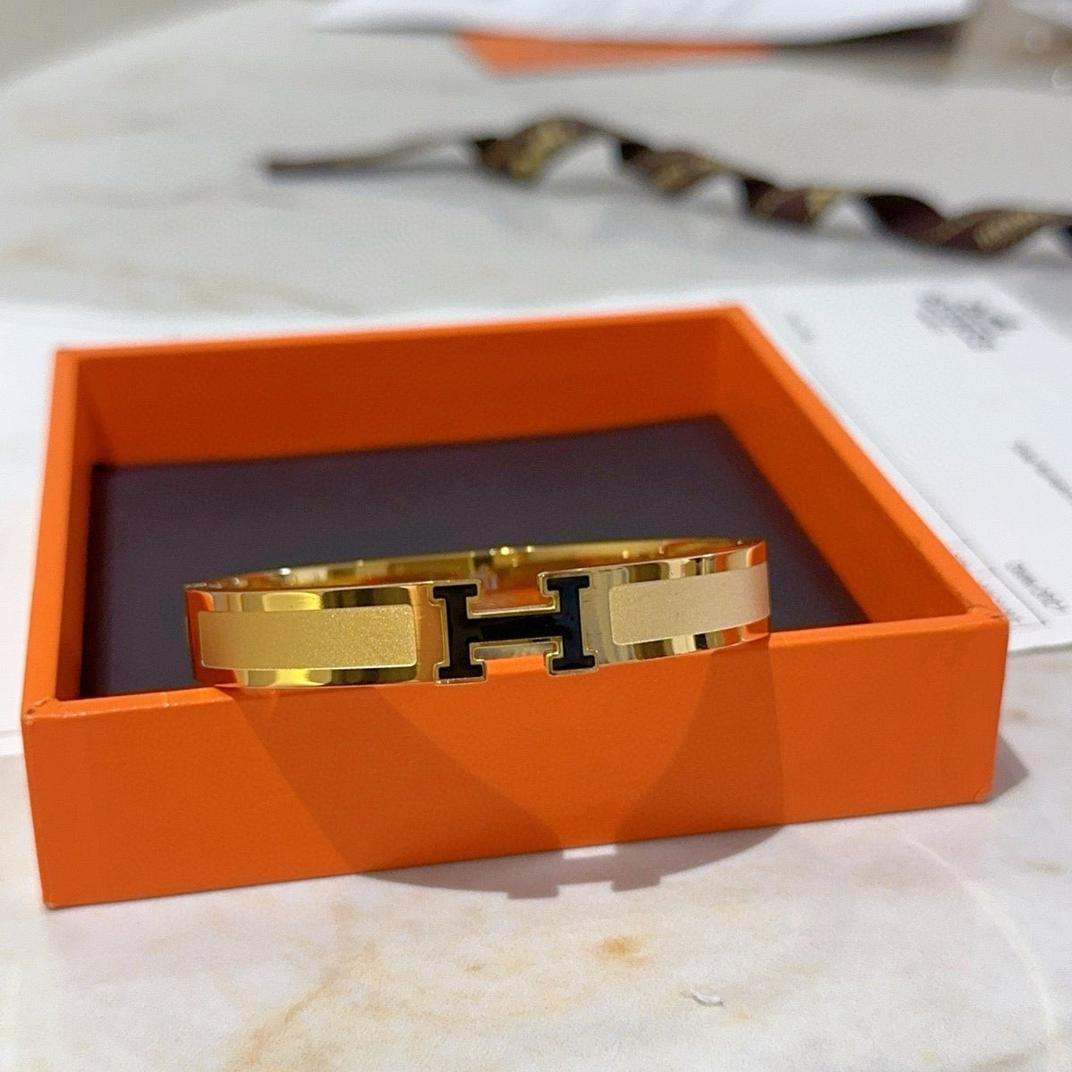 Martin Graham bangle in polished metal-tone – close-up detail