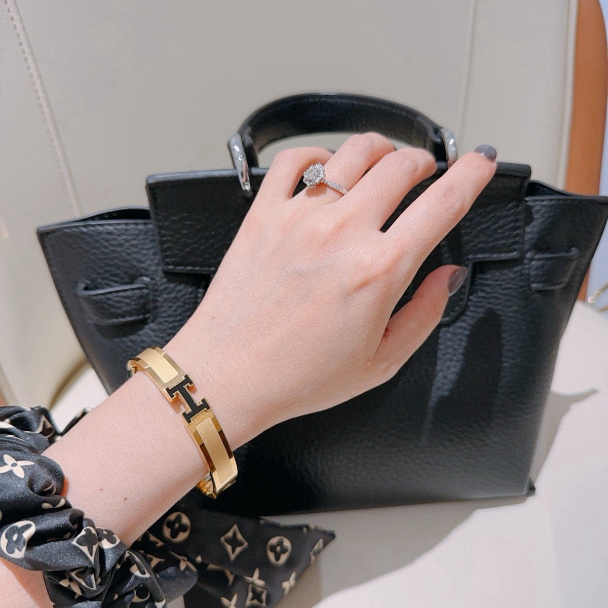 Martin Graham bangle in polished metal-tone – detail view