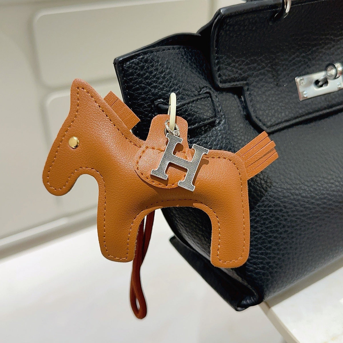 Martin Graham keychain in polished metal-tone – front product view