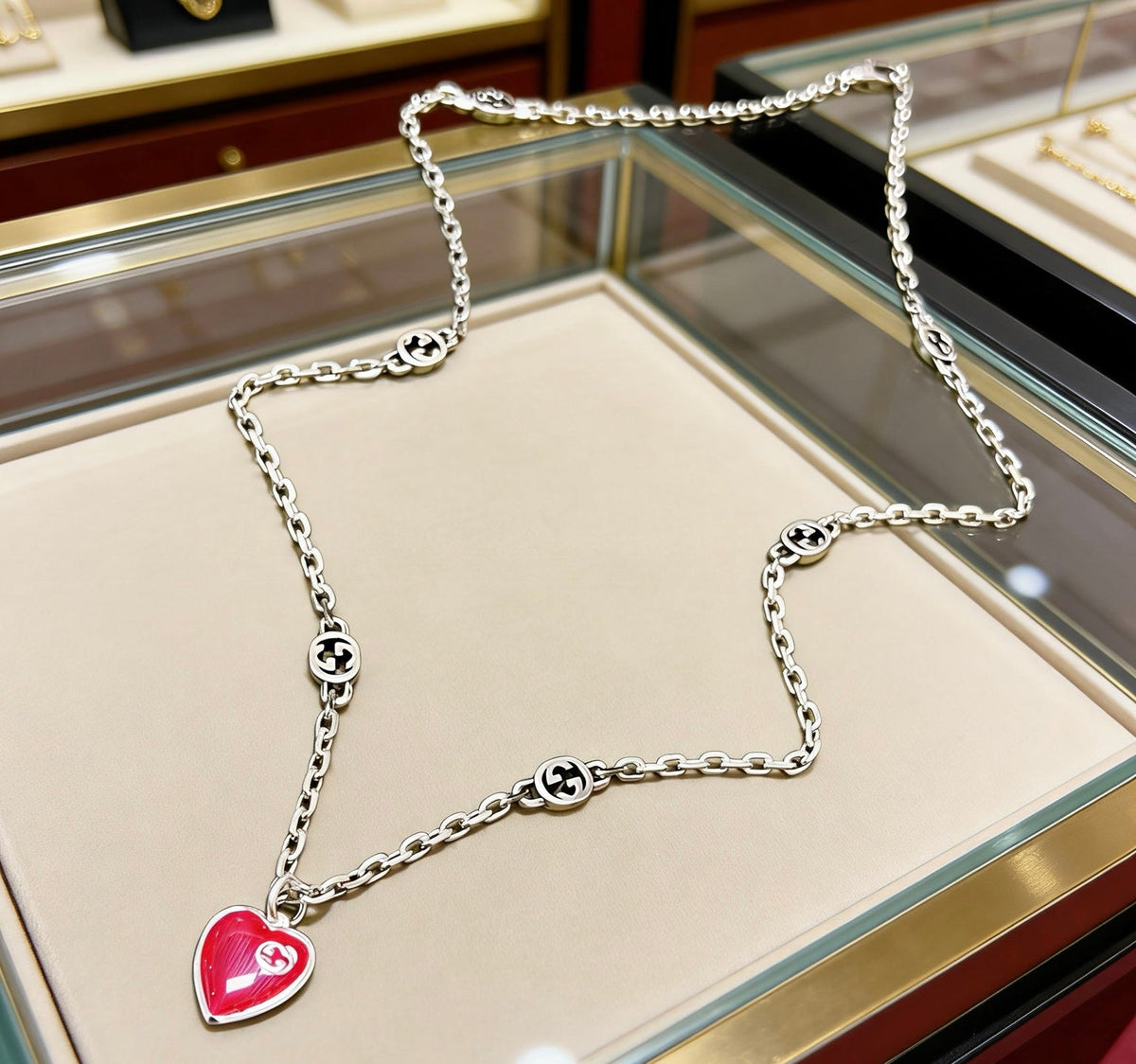 Martin Graham pendant necklace in polished metal-tone – side detail