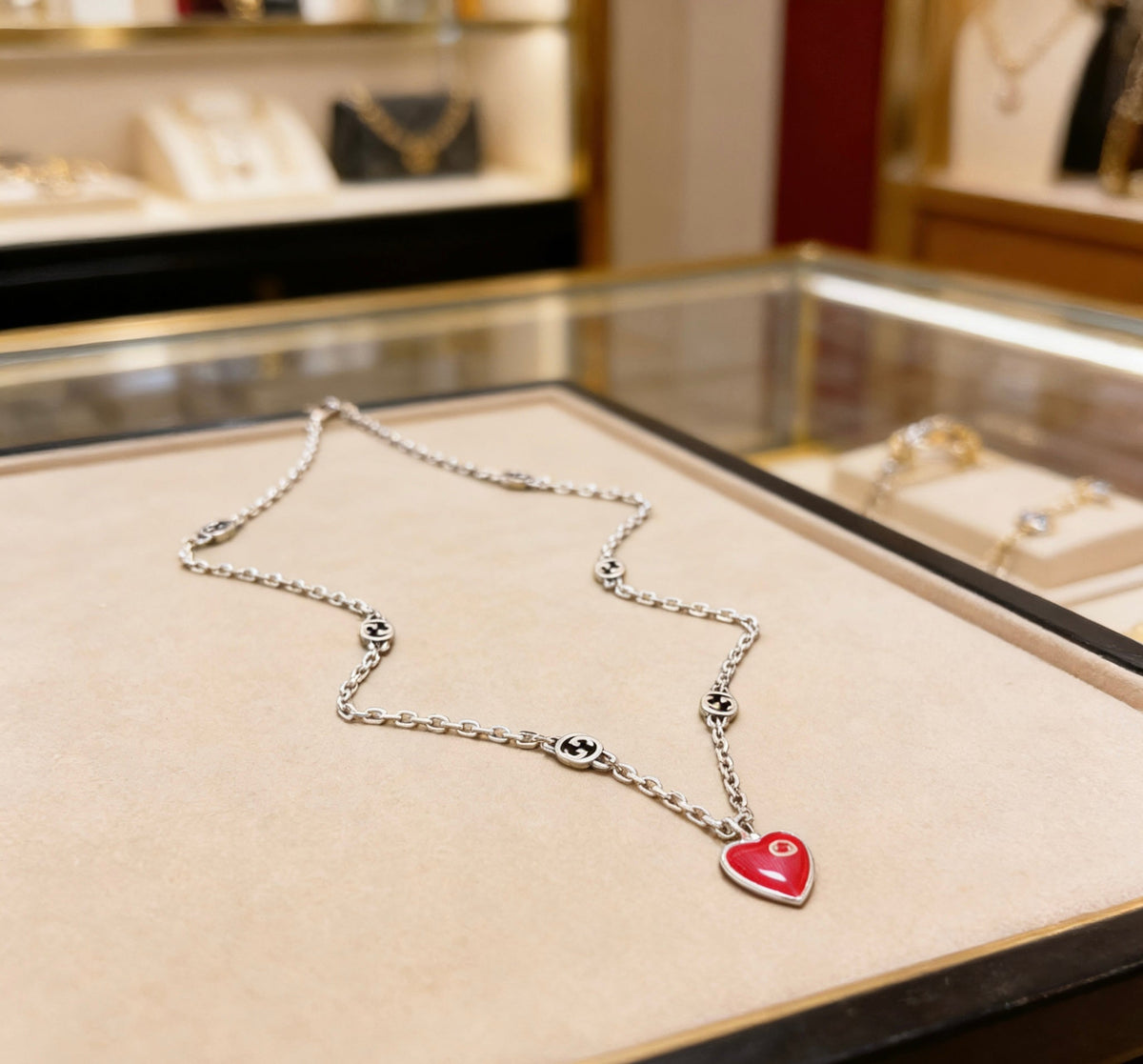 Martin Graham pendant necklace in polished metal-tone – front product view
