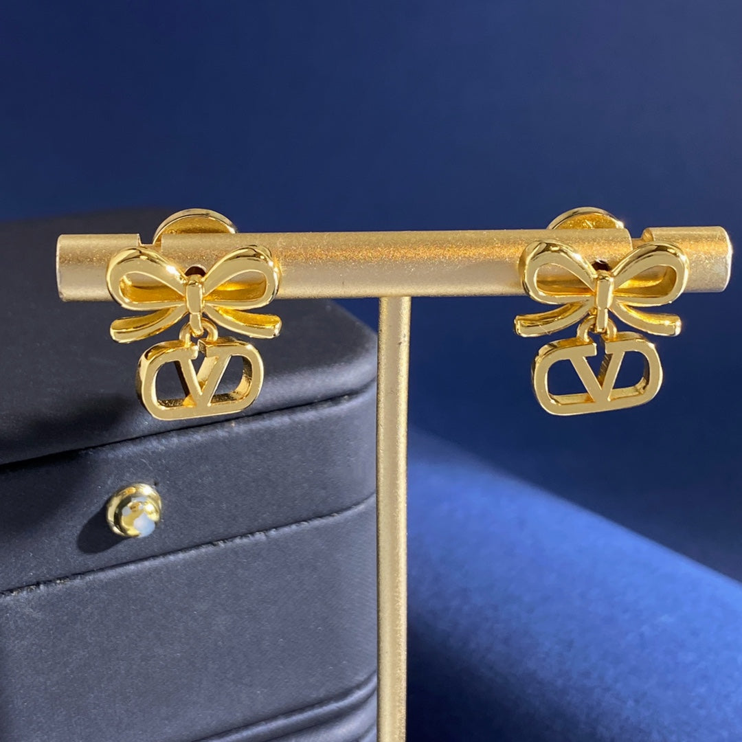 Martin Graham stud earrings in polished metal-tone – front view