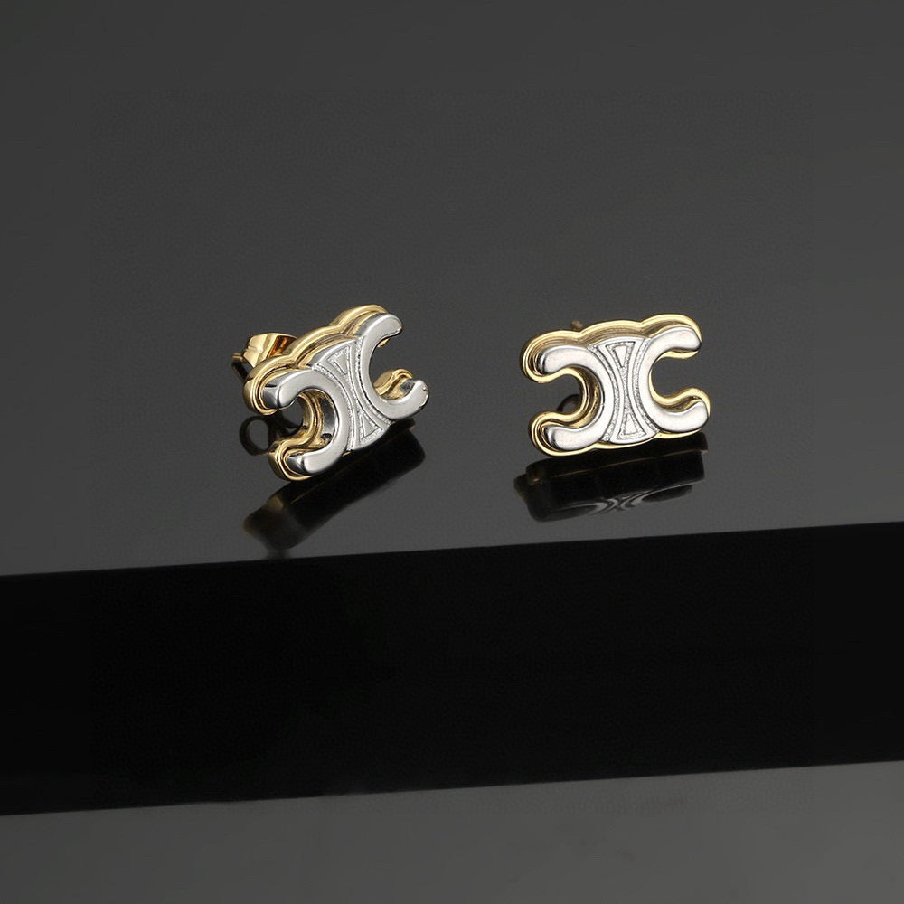 Martin Graham stud earrings in polished metal-tone – front view