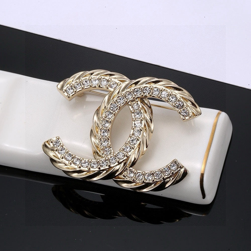 Martin Graham brooch in polished metal-tone – styled product view