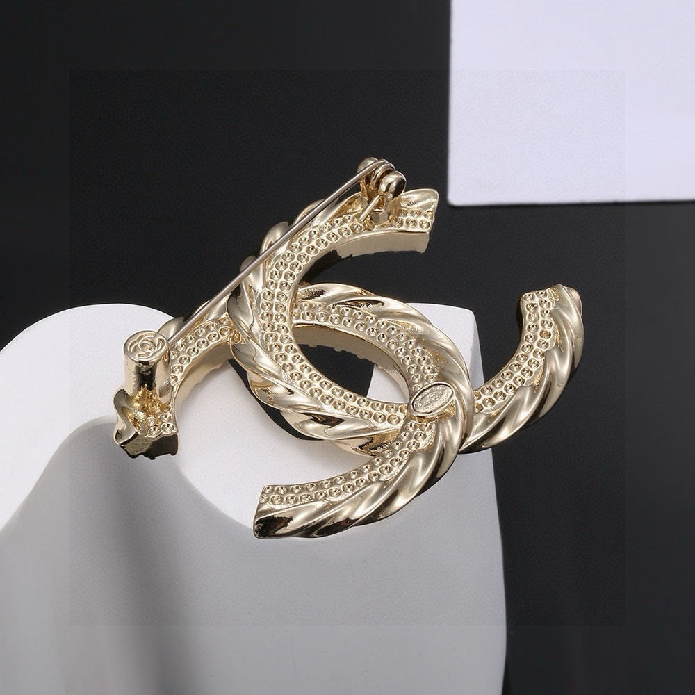 Martin Graham brooch in polished metal-tone – side detail