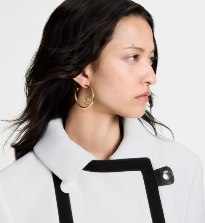 Martin Graham stud earrings in polished metal-tone – detail view